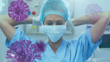 Kadın doktorun üzerinde yüzen makro Covid-19 hücrelerinin yüz maskesi takması. Coronavirus Covid-19 pandemik konsept dijital bileşik