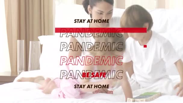 Animation Words Stay Home Pandemic Flashing Caucasian Family Playing Bed — Stock Video