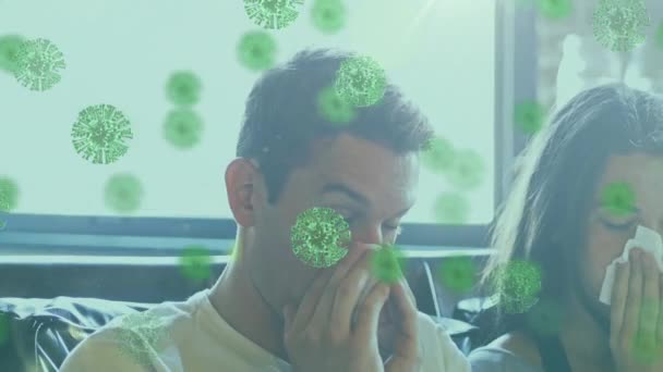 Animation de cellules macro Covid-19 sur un couple caucasien assis sur un canapé, en essuyant leur nez avec des tissus. Éloignement social isolement personnel en quarantaine verrouillage numérique composite 