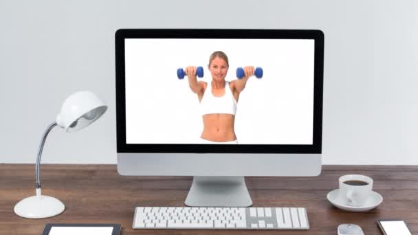 Animation Computer Monitor Showing Caucasian Woman Exercising Dumbbells Coronavirus Covid — Stock Video