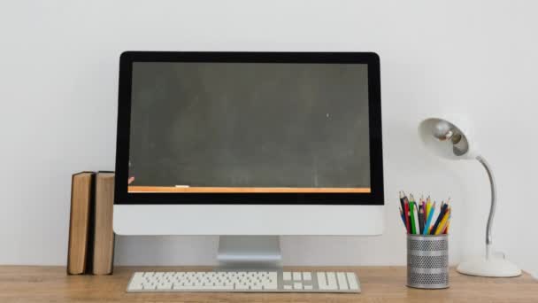 Animation Computer Monitor Showing Caucasian Woman Holding Pile Books Apple — Stock Video