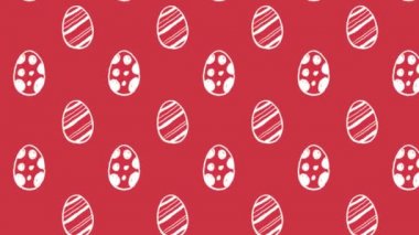 Beyaz desenli Paskalya yumurtalarının kırmızı arka planda kusursuz bir döngü içinde sırayla hareket edişinin animasyonu. Paskalya kutlaması konsepti dijital olarak oluşturuldu.