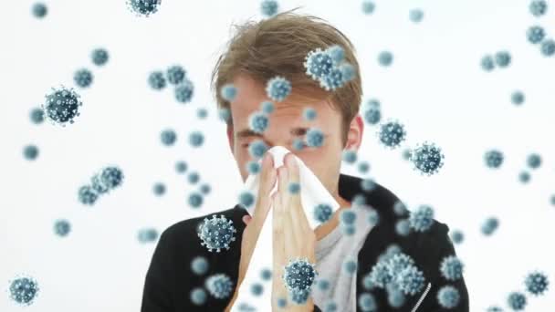 Animation de cellules macro Covid-19 flottant au-dessus d'un homme caucasien éternuant dans un tissu. Coronavirus Covid-19 pandémie concept composite numérique 