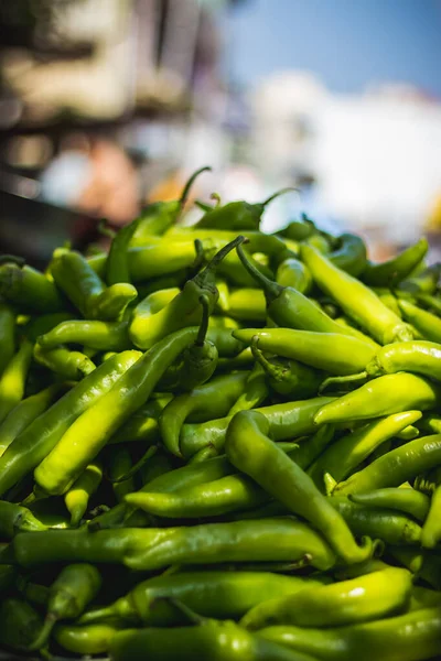 Hungarian wax pepper and Banana Pepper chili for sale on market background. selling green bajji chilli and mirchi bajji on market. Stock photo on