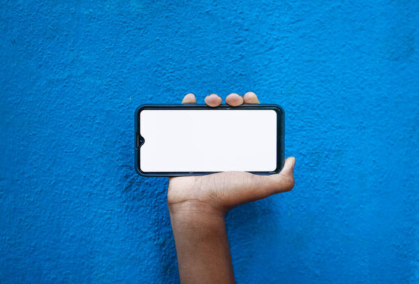 Boy Hand Showing Mobile Smartphone Screen White Color Isolated Blue — Stock Photo, Image