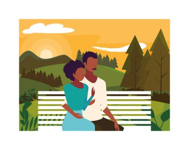 Birbirine aşık bir çift park koltuğunda oturuyor.