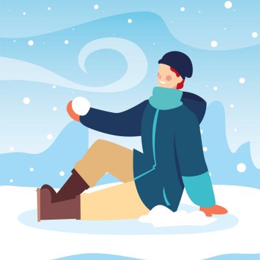 Kış giysileri içinde kar yağışı olan bir adam.