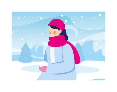 Kış kıyafetleri içinde kar yağışı olan bir kadın.