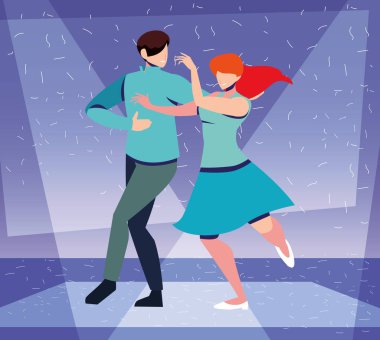 Gece kulübünde, müzikte ve gece hayatında dans eden iki kişi.