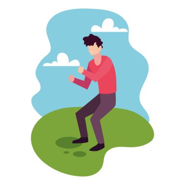 Manzara arka planında dans eden bir adam.