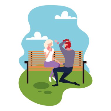 Birbirine aşık bir çift park koltuğunda oturuyor.