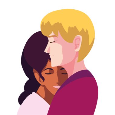 Birbirine aşık iki insan, bir erkek ve bir kadın birbirlerine sevgiyle sarılıyorlar.