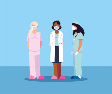 Kadın doktorlar ayakta, sağlık ekibi