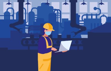 Yüz maskesi ile çalışan sanayi işçisi