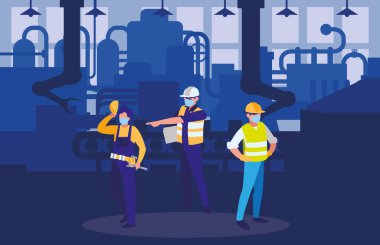 Yüz maskesi ile çalışan sanayi işçileri