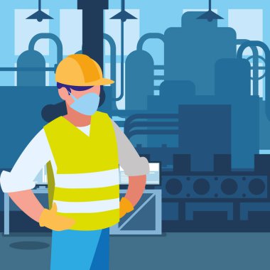 Yüz maskesi ile çalışan sanayi işçisi