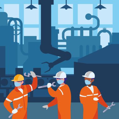 Yüz maskesi ile çalışan sanayi işçileri