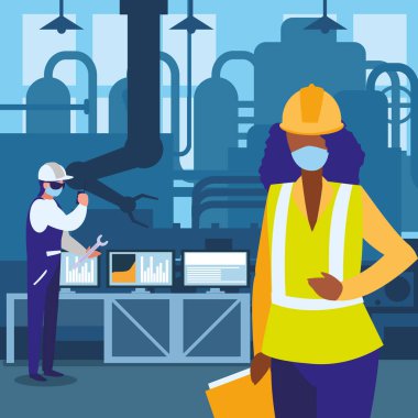 Yüz maskesi ile çalışan sanayi işçileri çifti