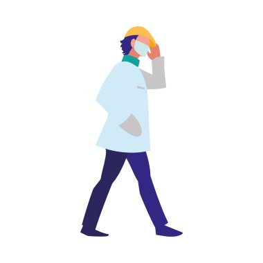 Yüz maskesi takmış bir adam şehirde yürüyor.