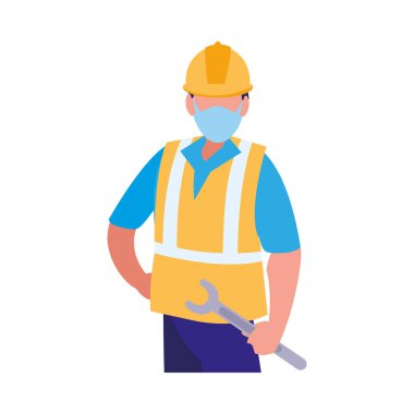 Yüz maskesi ile çalışan sanayi işçisi