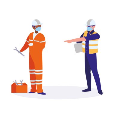 Yüz maskesi ile çalışan sanayi işçileri