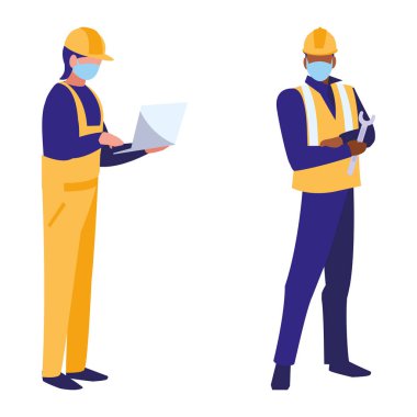 Yüz maskesi ile çalışan sanayi işçileri