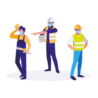 Yüz maskesi ile çalışan sanayi işçileri