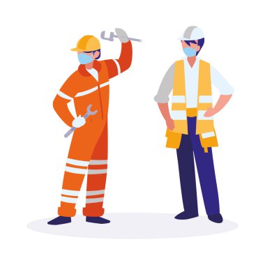 Yüz maskesi ile çalışan sanayi işçileri