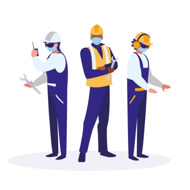 Yüz maskesi ile çalışan sanayi işçileri