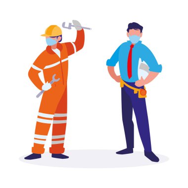 Yüz maskesi ile çalışan sanayi işçileri