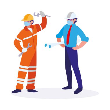 Yüz maskesi ile çalışan sanayi işçileri