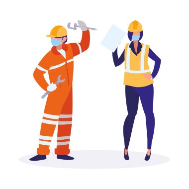 Yüz maskesi ile çalışan sanayi işçileri çifti