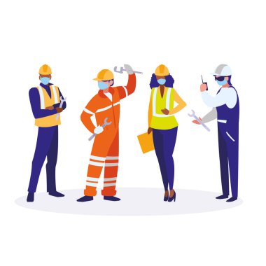 Yüz maskesi ile çalışan endüstriyel işçiler