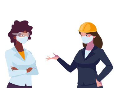 Yüz maskeli endüstriyel kadın işçiler