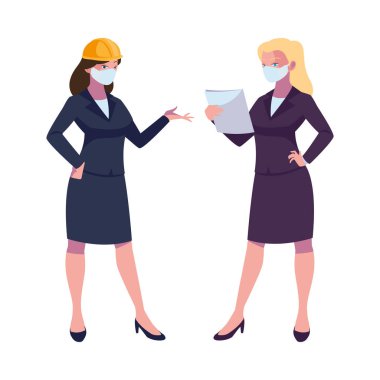 Yüz maskeli endüstriyel kadın işçiler