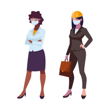 Yüz maskeli endüstriyel kadın işçiler