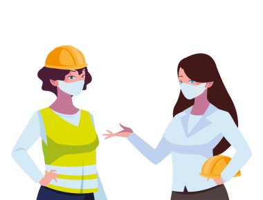 Yüz maskeli endüstriyel kadın işçiler
