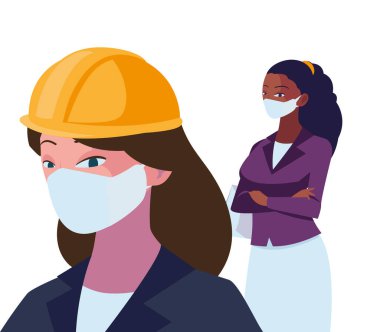 Yüz maskeli endüstriyel kadın işçiler