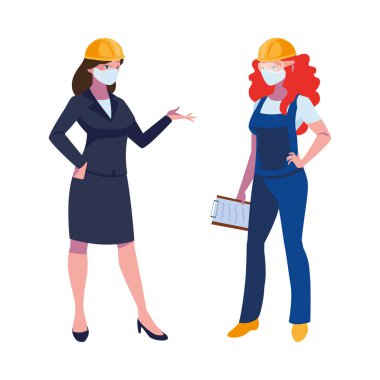 Yüz maskeli endüstriyel kadın işçiler