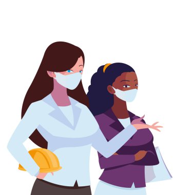 Yüz maskeli endüstriyel kadın işçiler