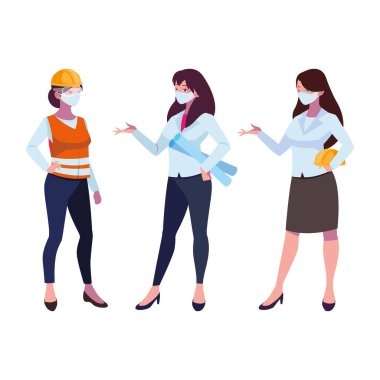 Yüz maskeleriyle çalışan kadın sanayi işçileri