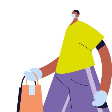 Yüz maskeli, eldivenli ve nakliye paketli bir adam.