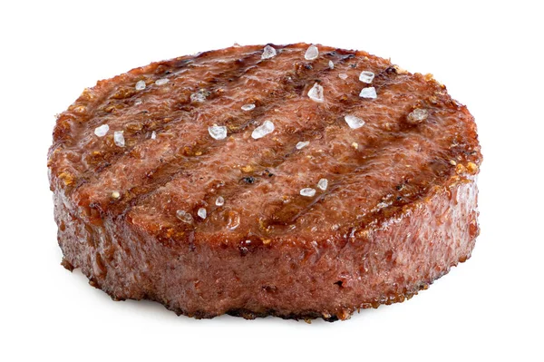 Patty hambúrguer grelhado à base de plantas com marcas de grelha e sal de rocha — Fotografia de Stock