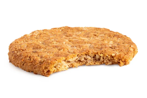 Crunchy oat and wholemeal biscuit isolated on white. Missing bit — Stock Photo, Image