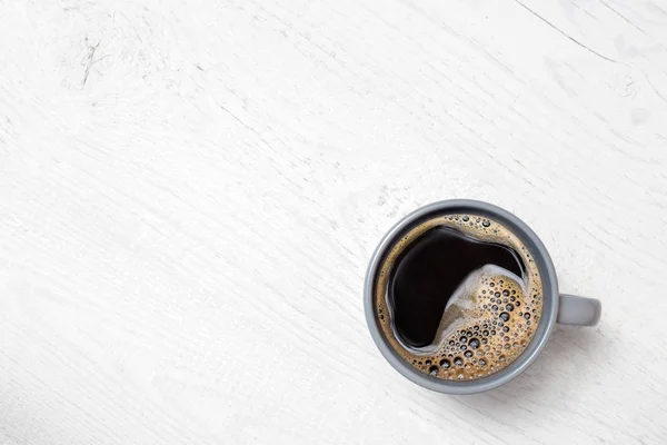 Black coffee in a blue-grey ceramic mug isolated on white painte — Stock Photo, Image