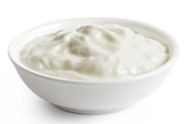 Белая керамическая миска йогурта Скайр, изолированная на белом . — стоковое фото