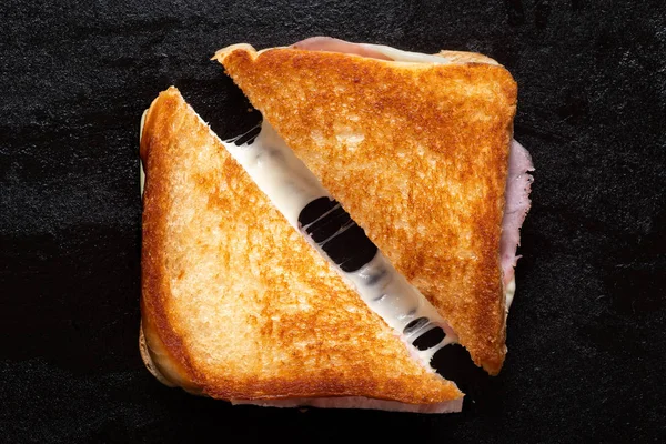 Cheese and ham toasted sandwich. — Stock Photo, Image