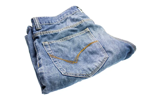 白い背景の青いデニムのジーンズのクローズ アップ ショット — ストック写真