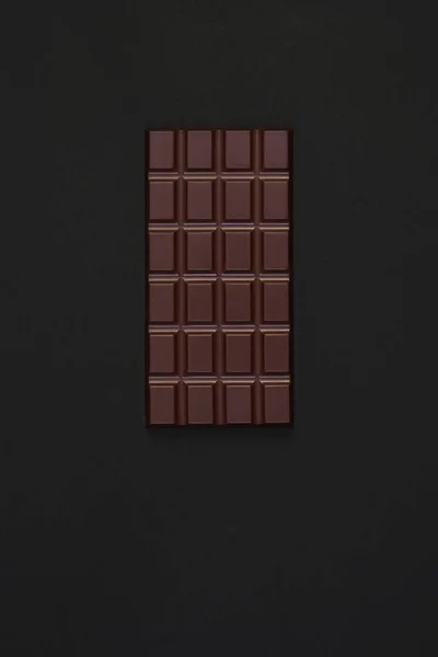 Donkere Chocolade Een Donkere Achtergrond — Stockfoto