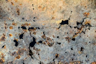 Arka plan paslı delik demiri, paslı çelik yüzey.